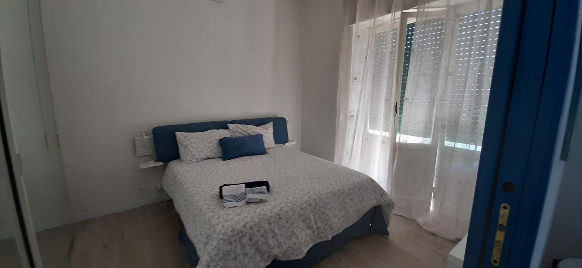Sunny Rome Sexy Grey & Cool Blue Apartment Room photo