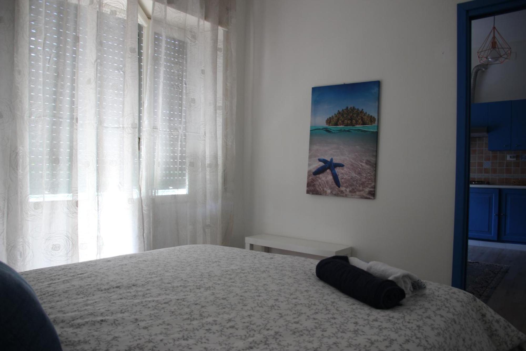 Sunny Rome Sexy Grey & Cool Blue Apartment Room photo